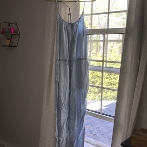 Light blue jumpsuit with cris cross back